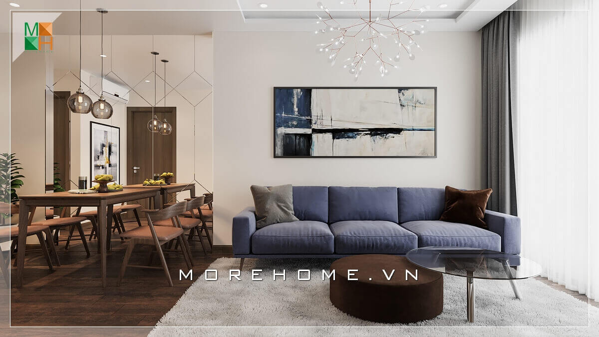 Mẫu thiết kế phòng khách hiện đại có diện tích nhỏ như chung cư, nhà phố, với bộ sofa văng bọc nỉ màu xanh tạo điểm nhấn nổi bật cho không gian căn phòng